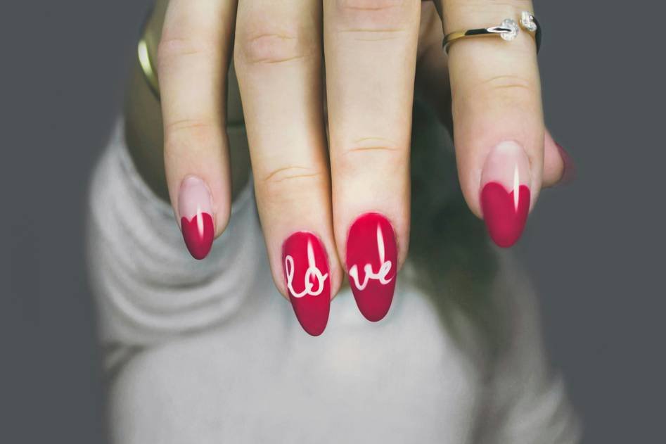Close-up of reusable nail stencil sheets in soft packaging