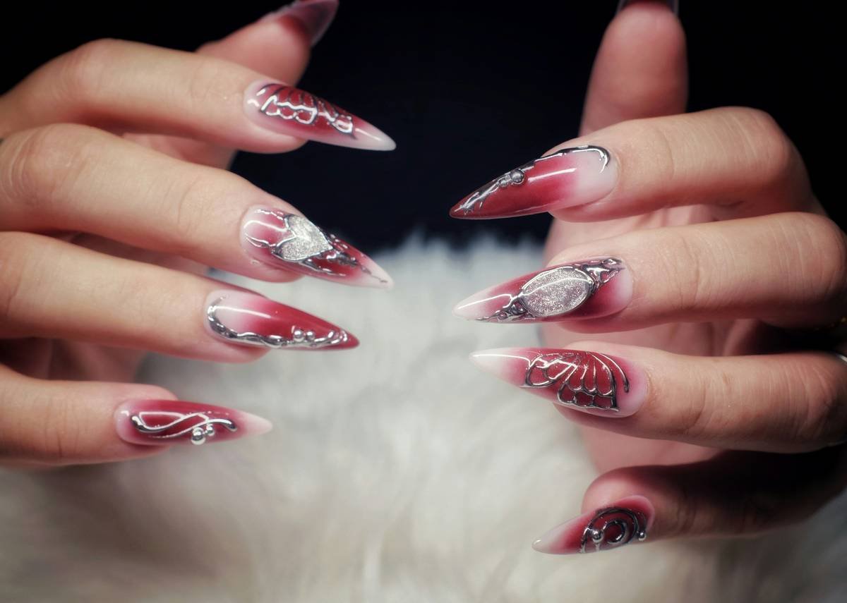 Side-by-side comparison: left shows bleeding nail stencil art with blurred lines; right shows crisp, clean floral stencil design with sharp edges